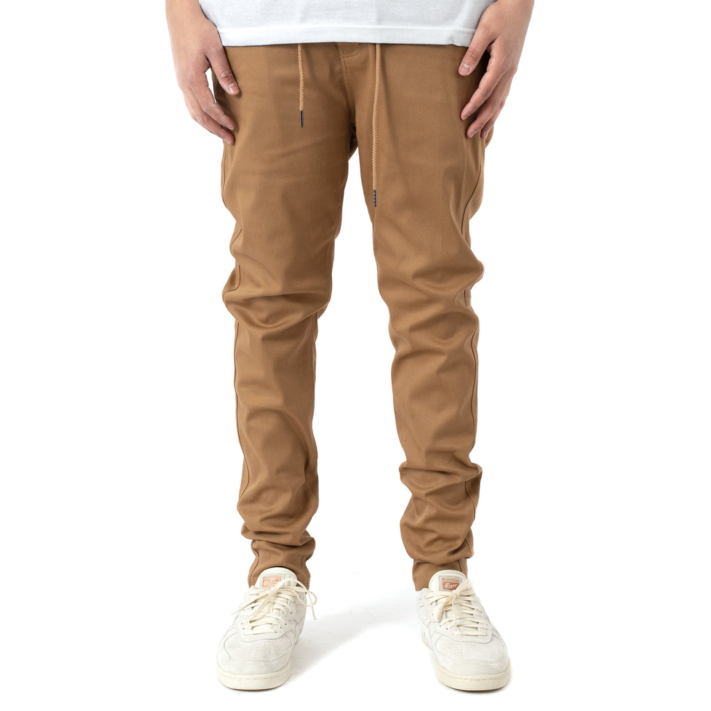 HERMAN&CO UNISEX TAPERED JOGGERS - Tracksuit bottoms - brown 